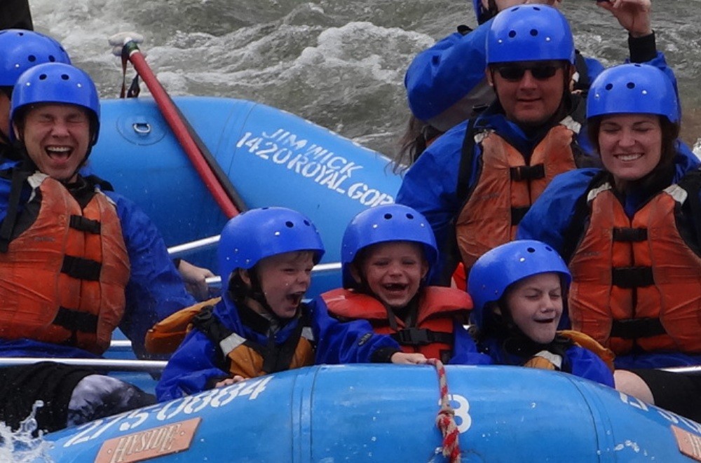 Kids having fun rafting on the Arkansas River's Bighorn Sheep Canyon near Canon City, Colorado.